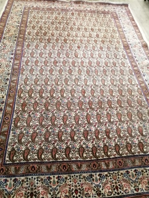 A North West Persian Boteh, ivory ground carpet 306 x 212cm